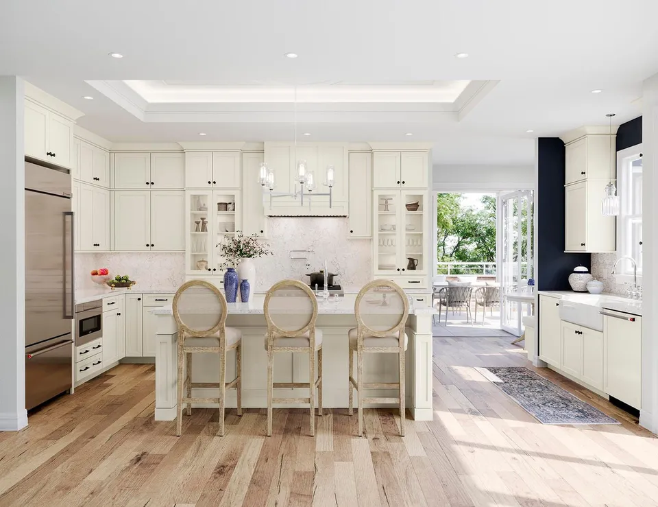Waypoint 410 kitchen in Painted Vanilla with a cream island and wood flooring.